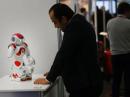 当地时间1月28日，西班牙马德里举行国际机器人博览会，各色机器人争奇斗异，吸人眼球。为期4天的展会将展现机器人发展方面所举得的成就。